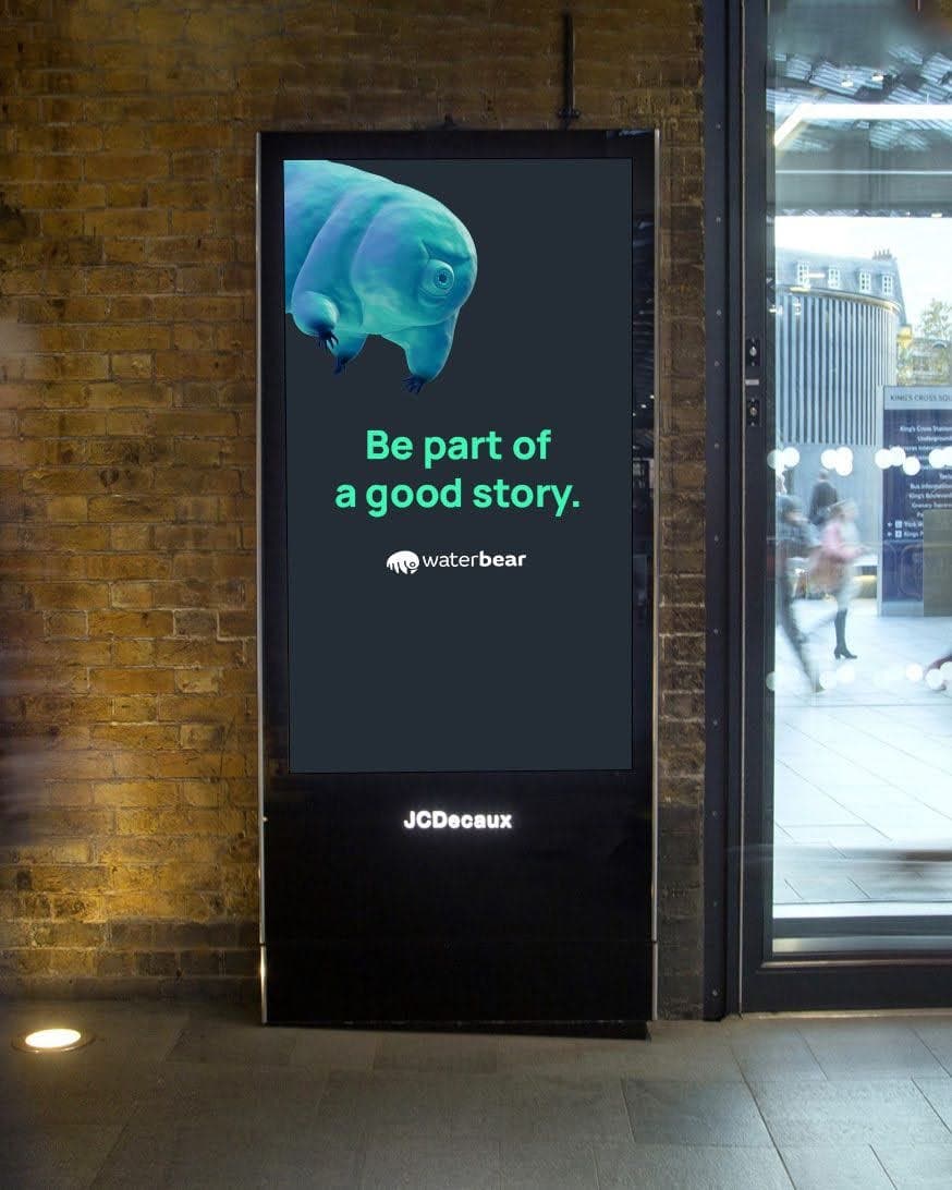 WaterBear smaller billboard in train station